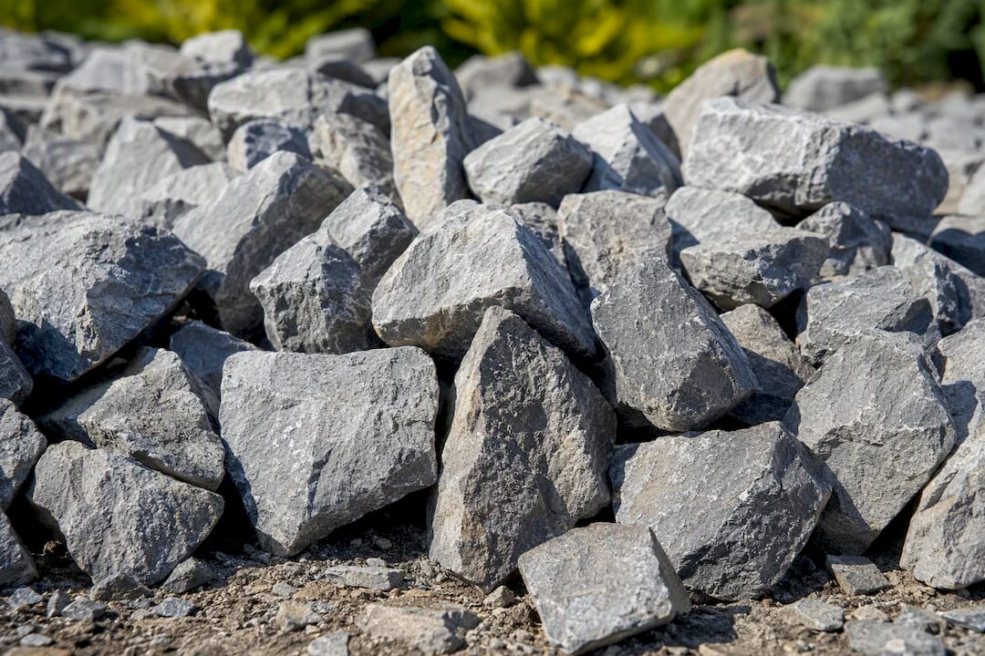 Close-up of angular #57 drain stone pile