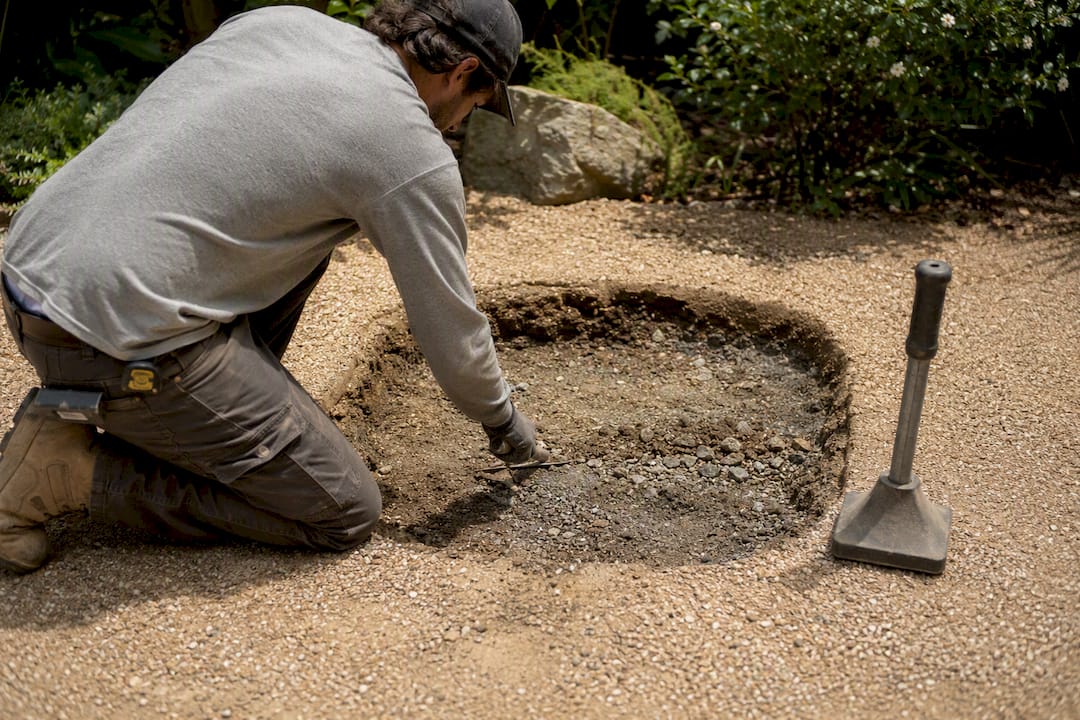 Patio soft spot being excavated for repair
